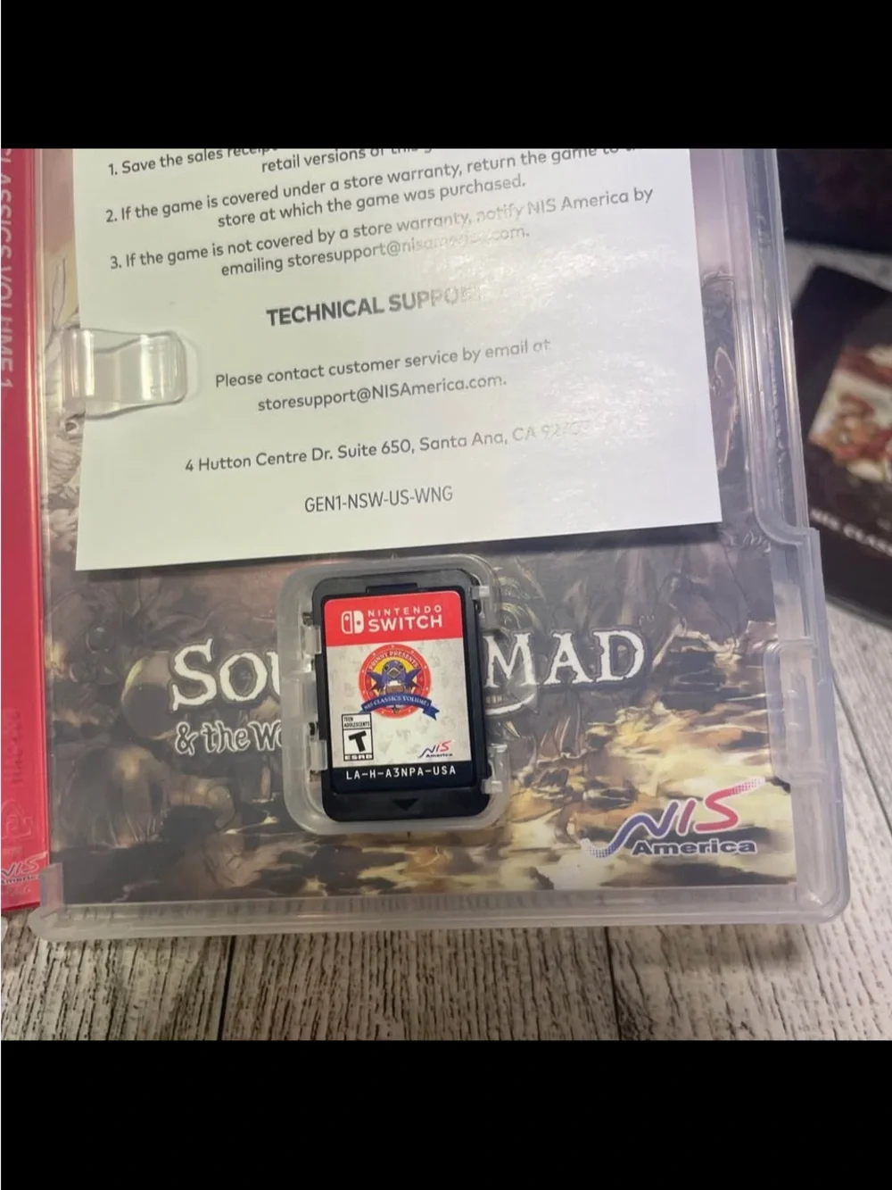 Nintendo Switch game card with black and green contacts
